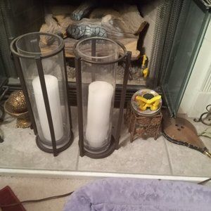 2 ft and a half candles with candles inside of it and a candelabra about 4 ft Hi